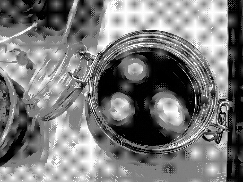 Eggs in a storage jar to marinade them in water and soy sauce