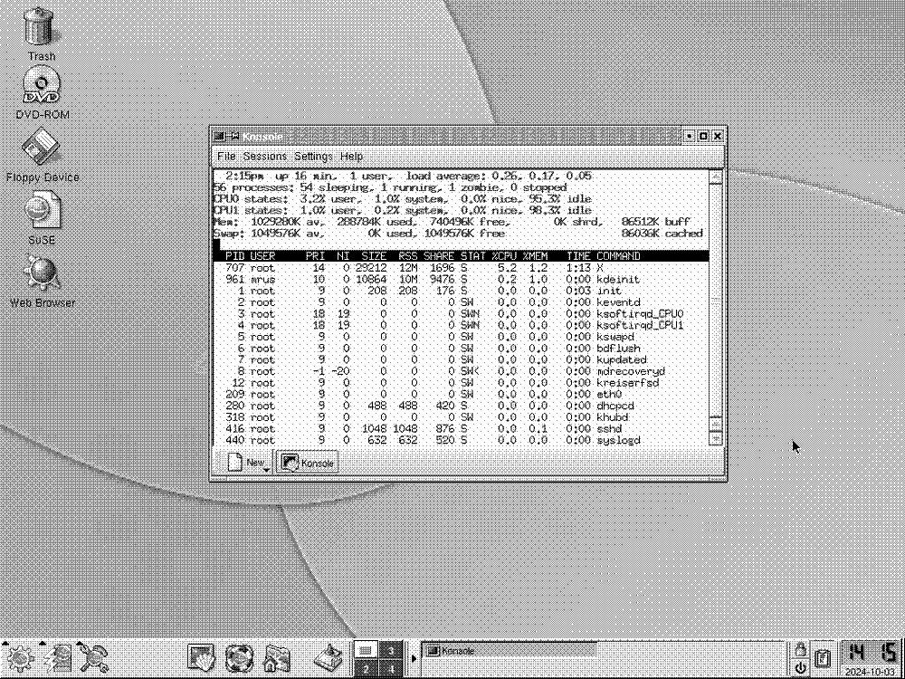 Screenshot of KDE2 under SuSE Linux 7.3 showing Konsole with top running